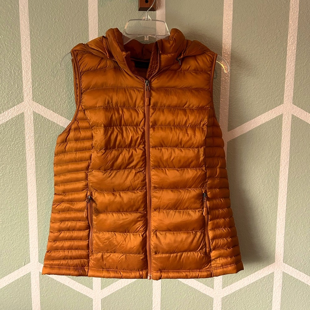 Copper colored vest with removable hood